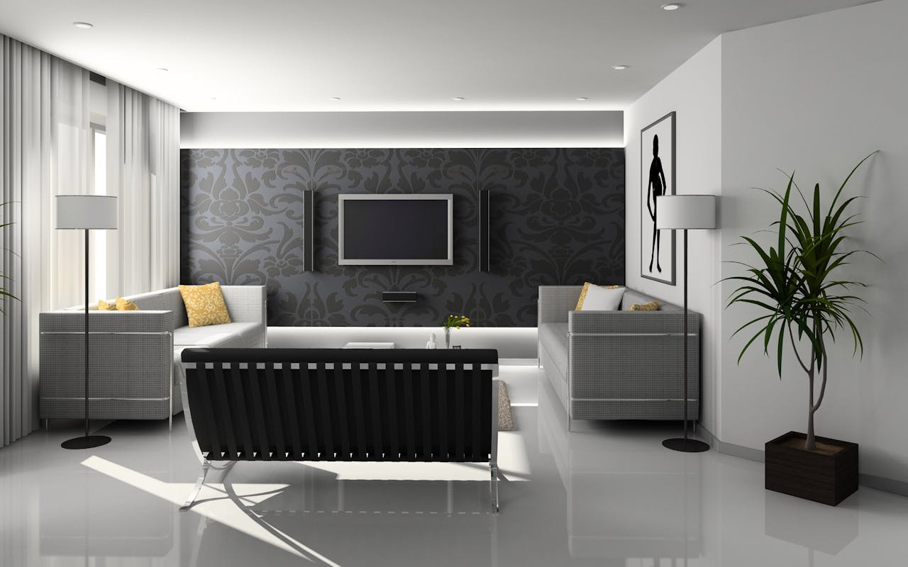 A sleek and modern living room with minimalist decor and monochrome theme.